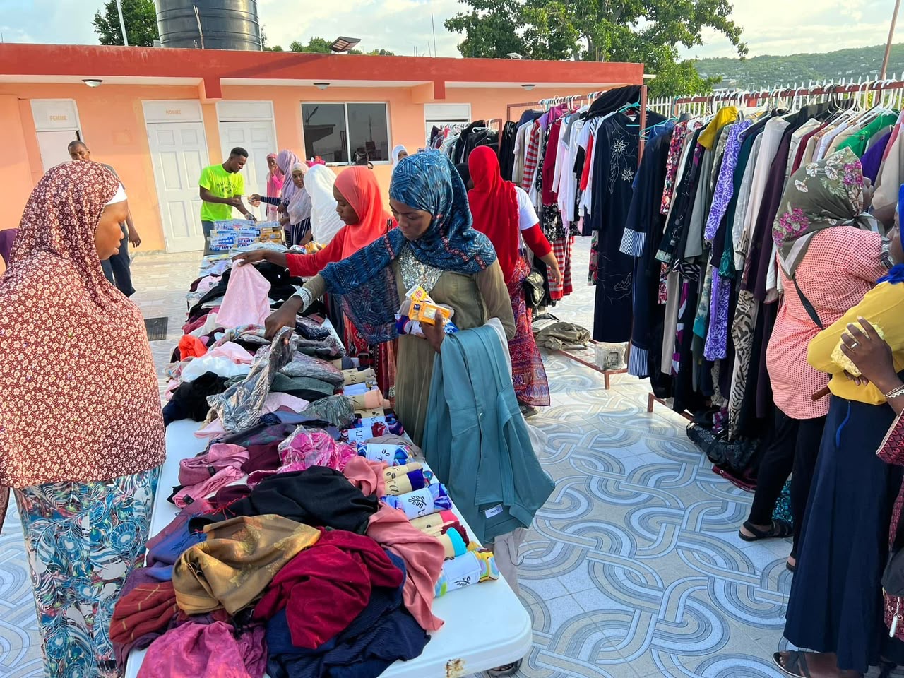 Clothing distribution at the masjid courtyard.
